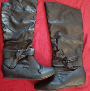 Knee high faux bow boot
